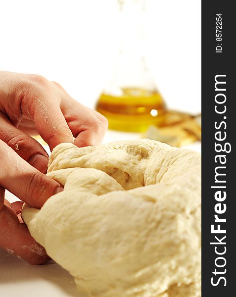 Dough Preparation with Olive Oil on a Background