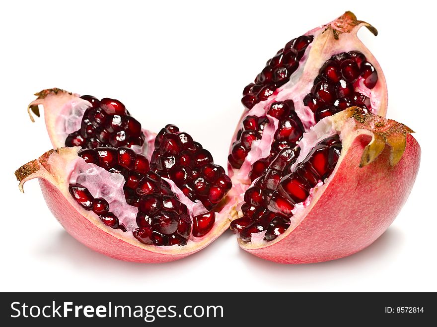 Juicy pomegranate on a white