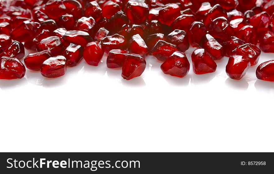 Juicy pomegranate on a white