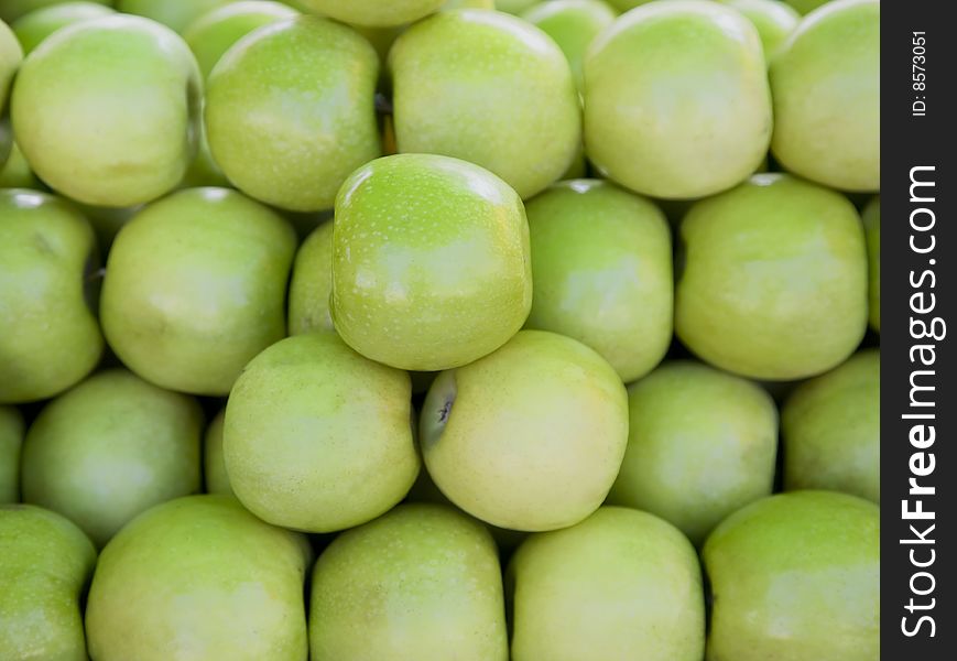 Row of Organic Granny Smith apples