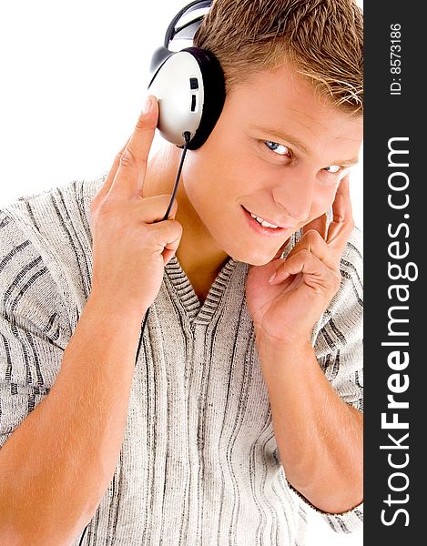Man listening to music on headphone on an isolated background
