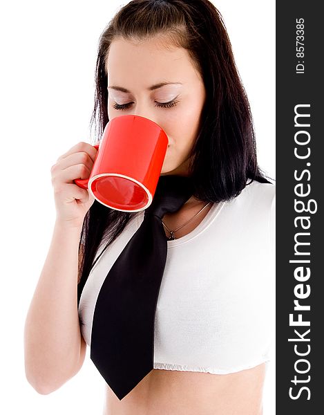 Young female drinking coffee with white background