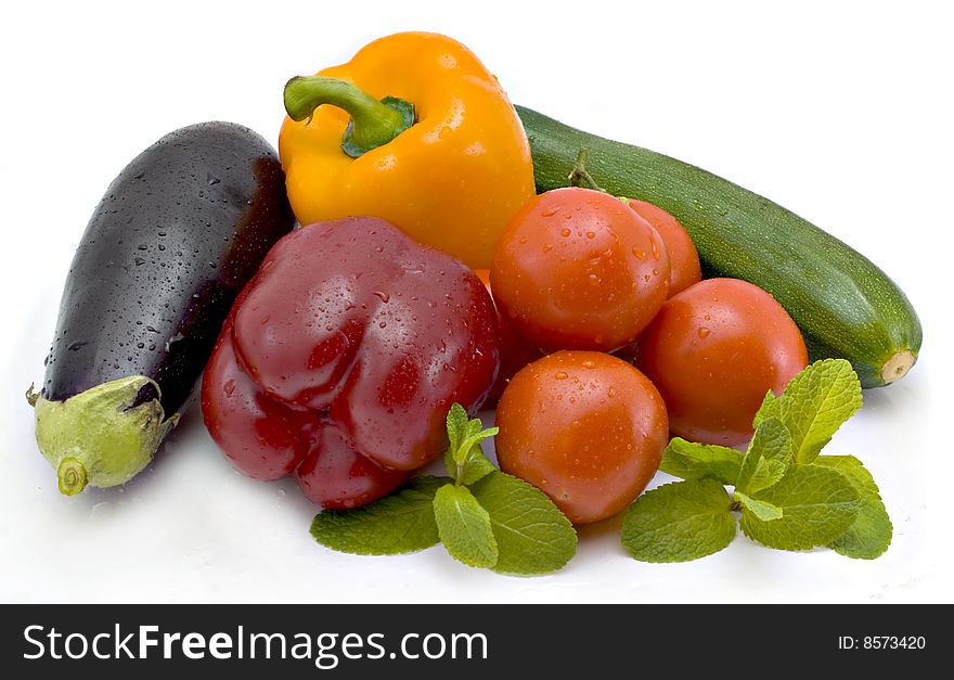 Pepper, eggplant and tomatoes isolated on the white. Pepper, eggplant and tomatoes isolated on the white