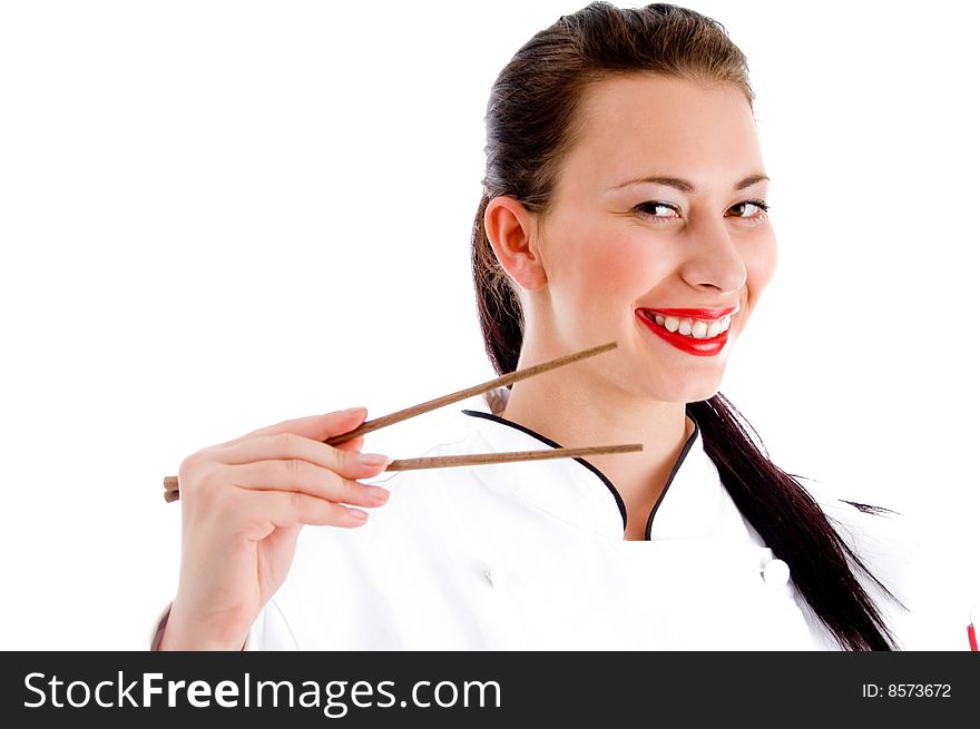 Female chef holding chopsticks on an isolated white background