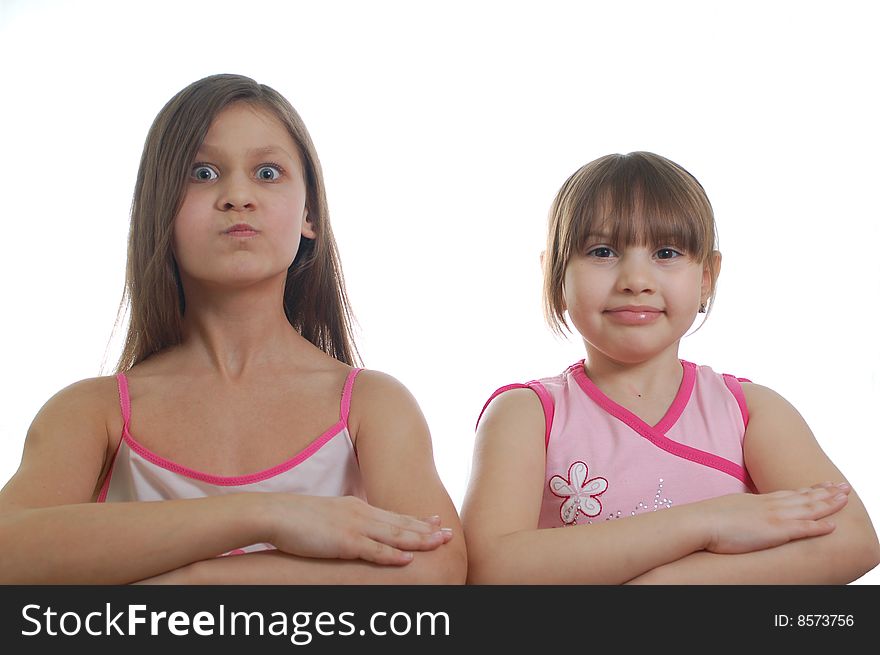 Two young girls isolated on the white background