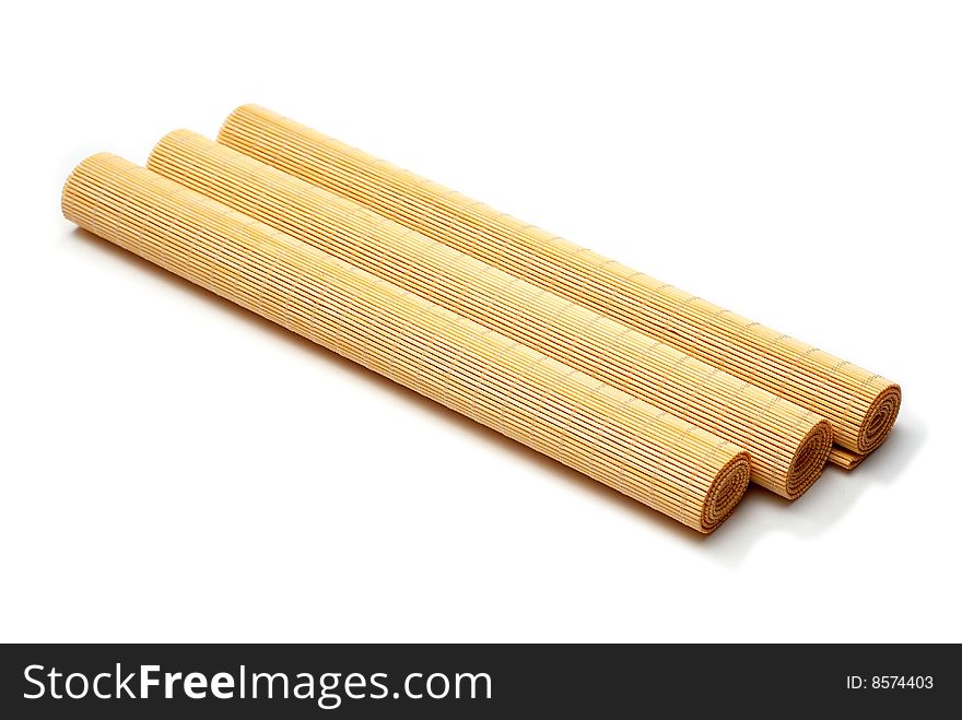 Bamboo stick sushi pads isolated on a white background