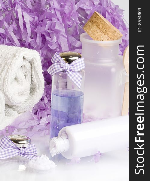 Spa essentials, cream and towel