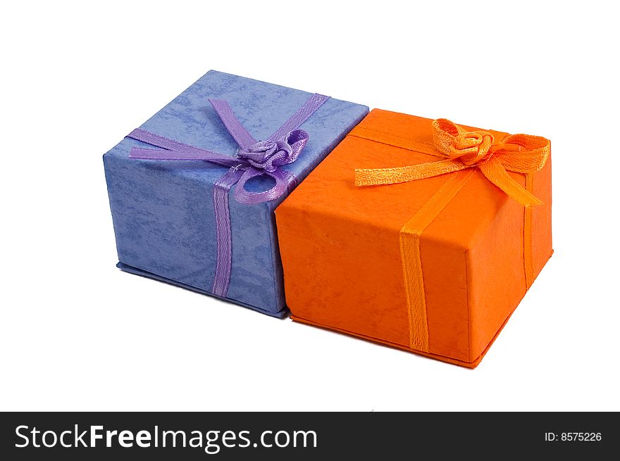 Two small ring boxes with bows, isolated on a white background