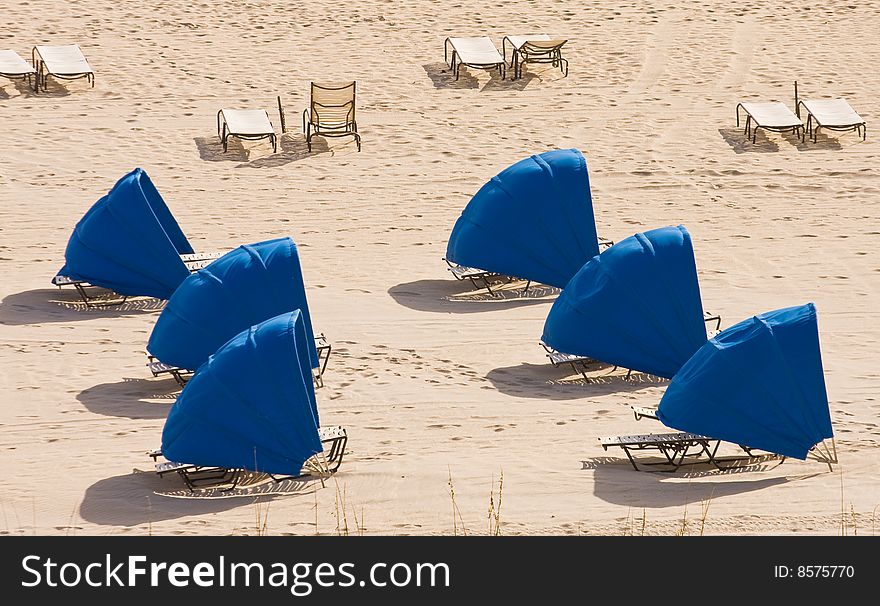 Blue Sun Umbrellas On Beach