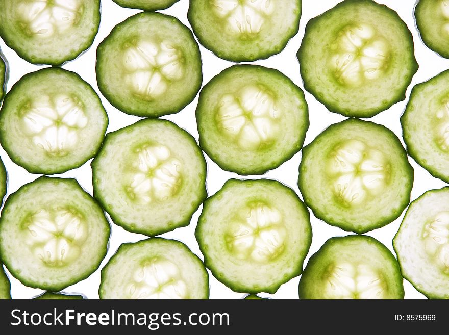 Fresh cucumber slices isolated on white background