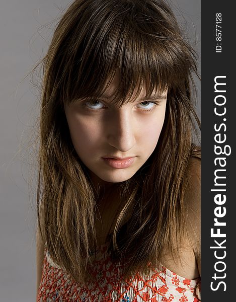 Distrustful teenager with the penetrating sight portrait