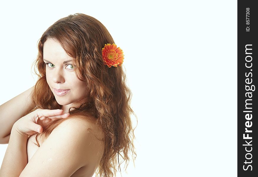 Beautiful Woman With Flower In A Hair