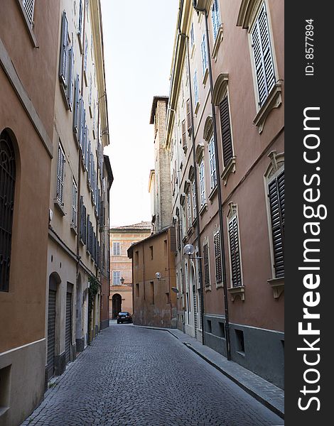 Lane in Modena in summer with blue sky