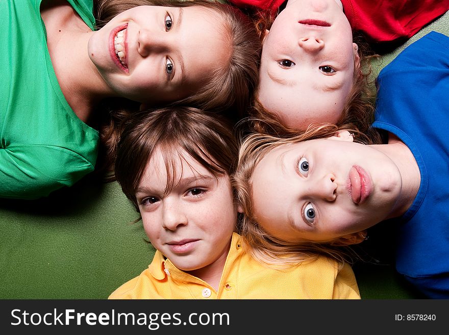 Group of little students with different ages in a happy mood. Group of little students with different ages in a happy mood