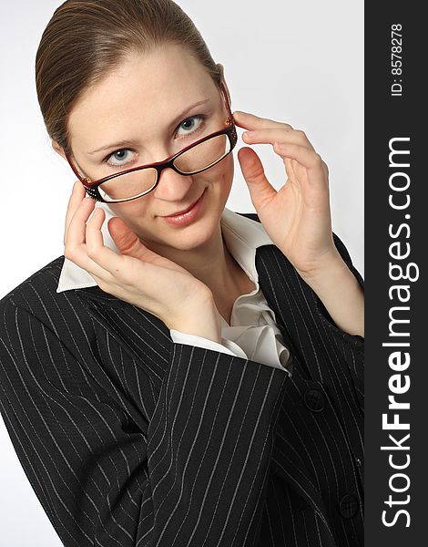 Young beautiful businesswoman with glasses