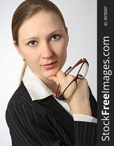 Young Beautiful Businesswoman With Glasses