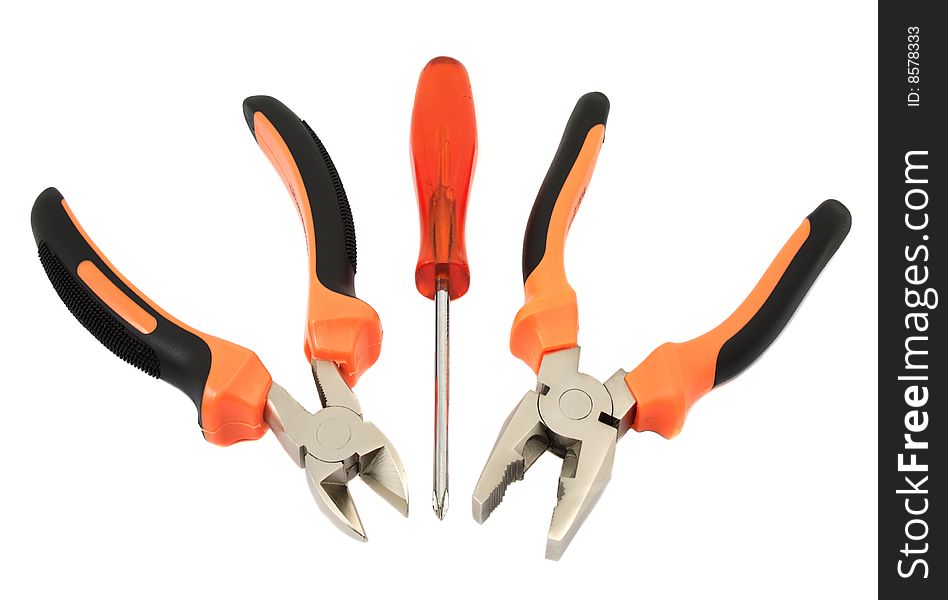 Screw-driver, flat-nose pliers and wire cutter on a white background. Screw-driver, flat-nose pliers and wire cutter on a white background