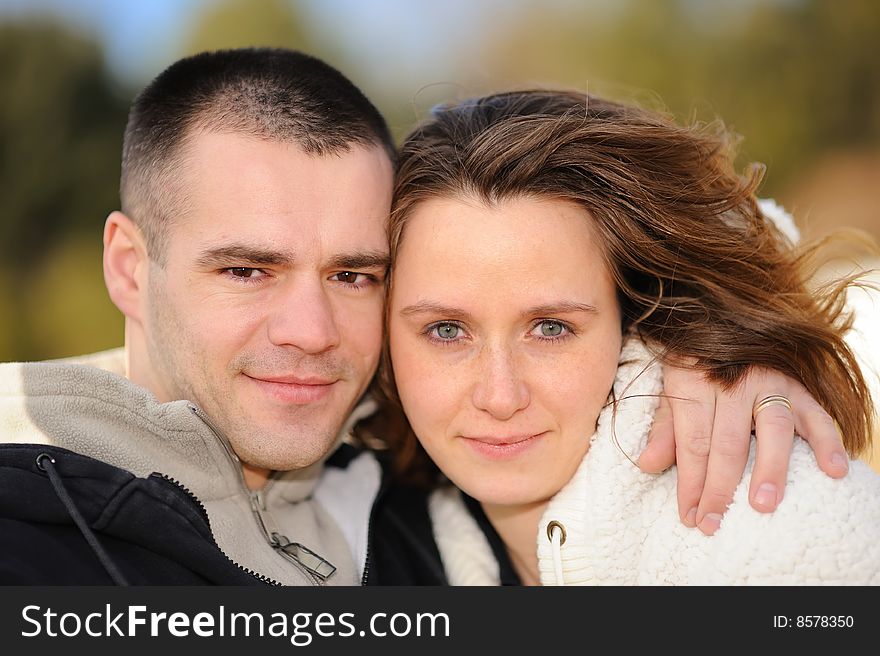 Portrait of the young couple outdoors