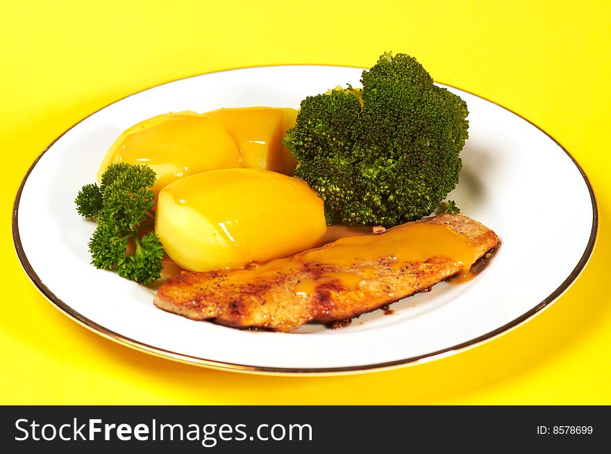 Cutlet with broccoli and potatoes