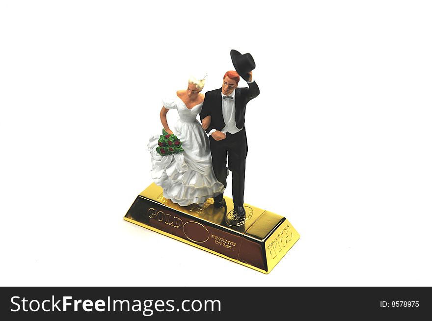 Bride and groom on a bar of gold. Bride and groom on a bar of gold