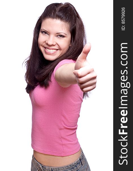 Smiling young woman giving thumbs-up on a white background