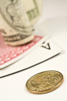 Dollar Bill And Coin With Pair Of Cards Stock Photo