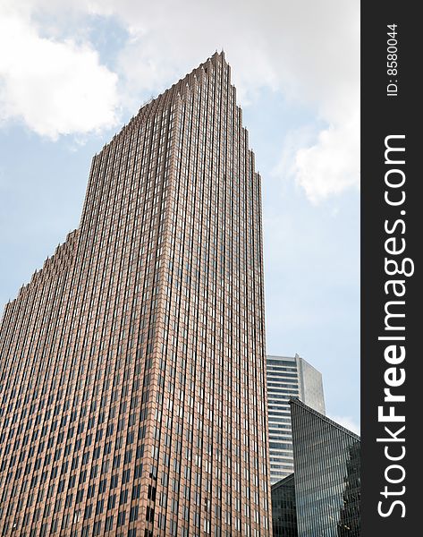 Great Towering Skyscrapers against cloudy sky