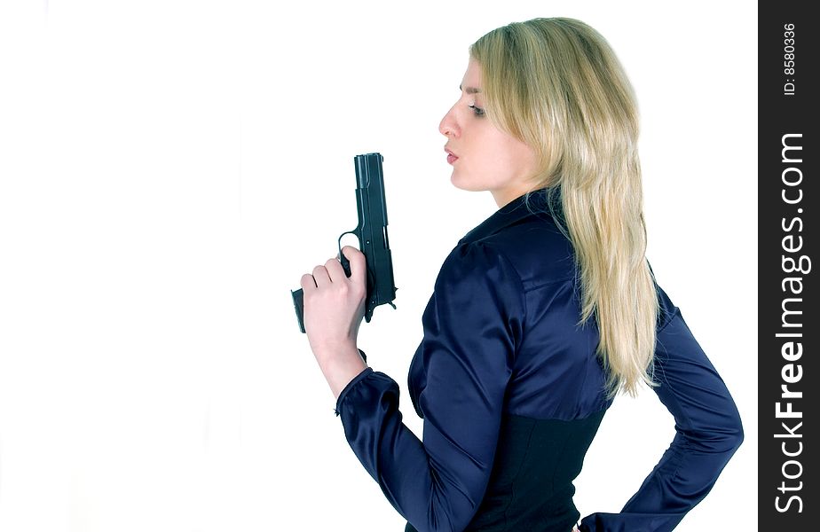 Young girl with gun isolated on white