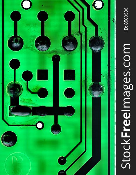 Close-up of green electronic printed circuit board