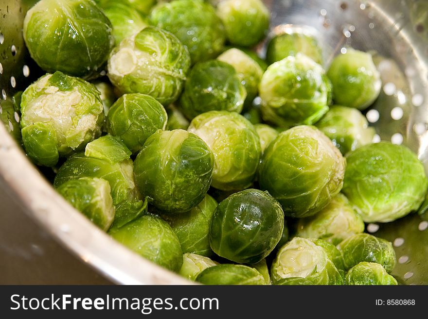 Brussel sprout in silver strainer