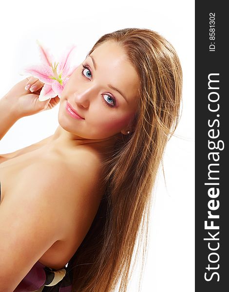 Beautiful young woman with lily flower. Beautiful young woman with lily flower