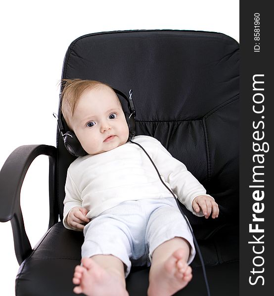 Baby with headphones on white