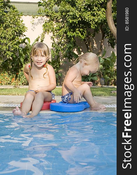 Two Children In A Pool