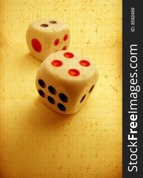 Square dice on color background