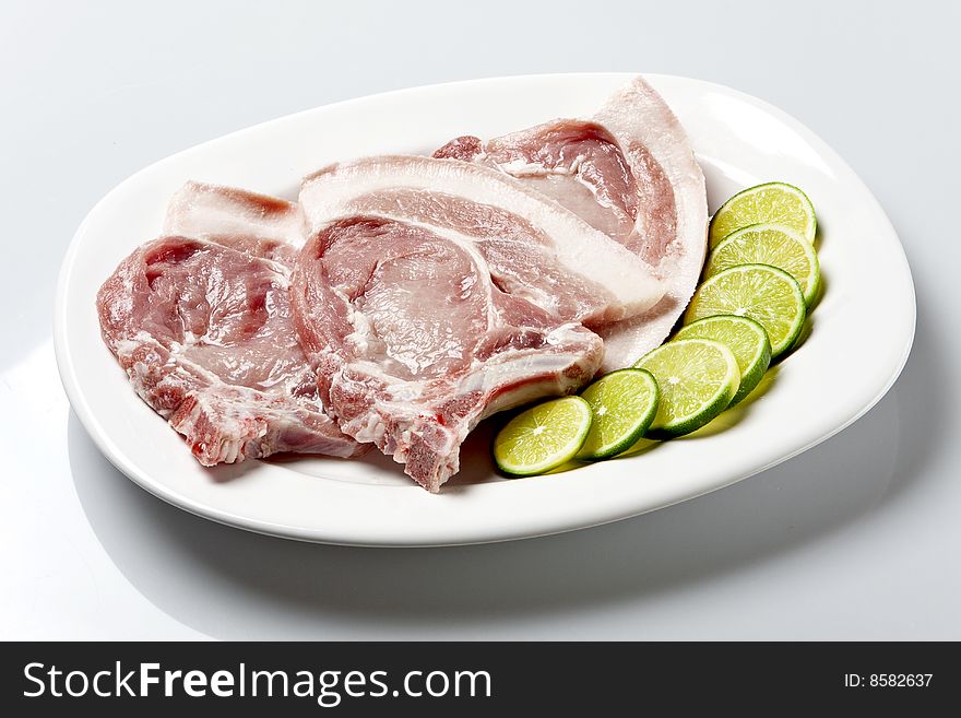 Raw pork meat cut known as Pork Steak or loin chop