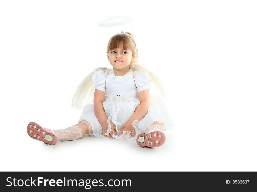 Beautiful angel child. Shot in a studio. Beautiful angel child. Shot in a studio.