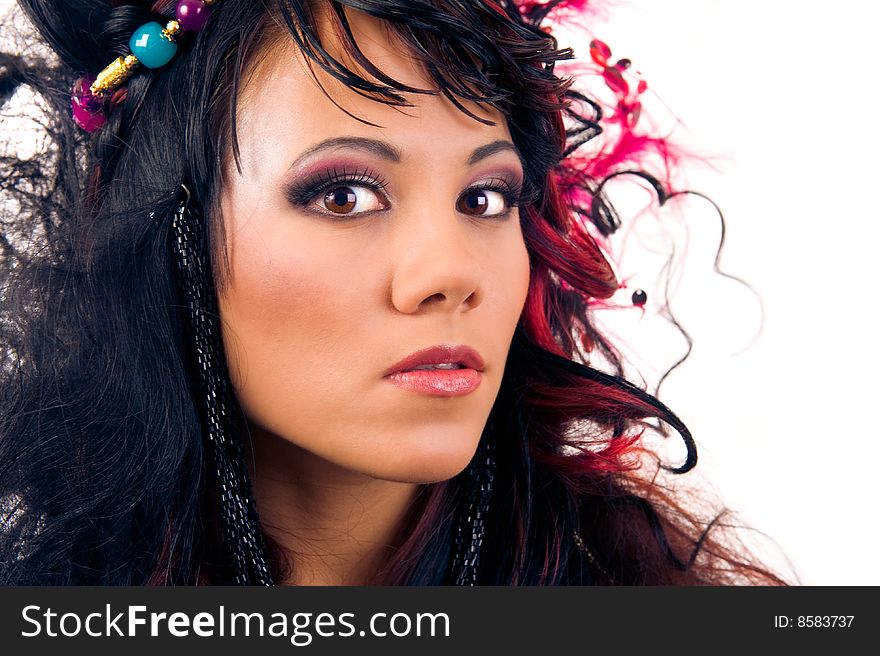 Glamour hairstyle. Close-up portrait of beautiful asian girl