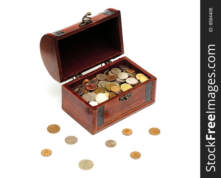 Open wood chest and coins on the white background. Open wood chest and coins on the white background