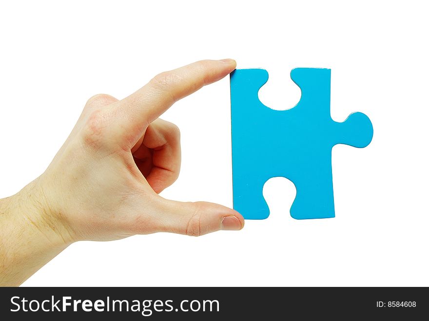 Puzzle in hand isolated on white background