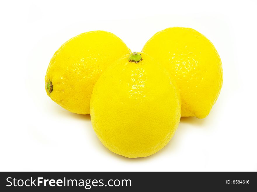 Yellow fresh lemons isolated on a white