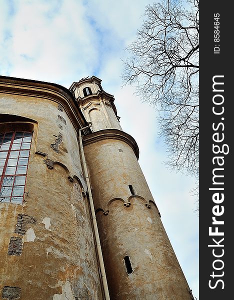 Ancient church. Spring sky, cloudy