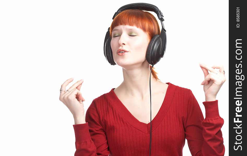 Beauty girl in head phones on white background