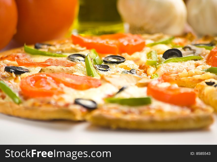 Homemade pizza with fresh tomato olive mushroom cheese isolated. Homemade pizza with fresh tomato olive mushroom cheese isolated