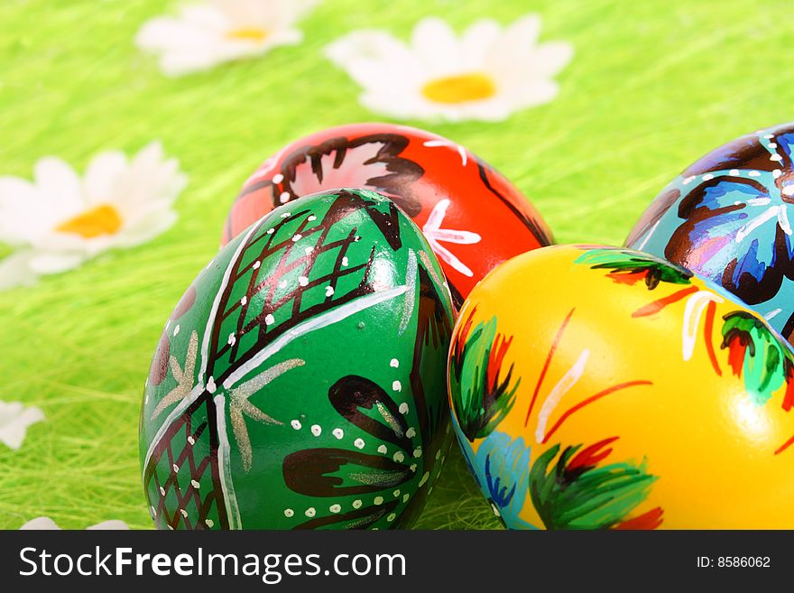 Painted Colorful Easter Eggs on green Grass