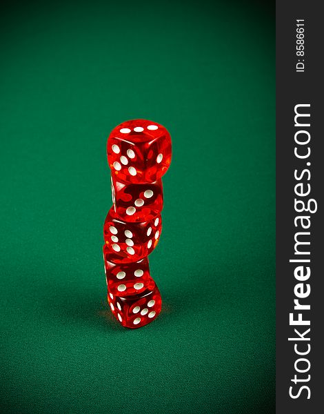 Tower of red dice on casino table