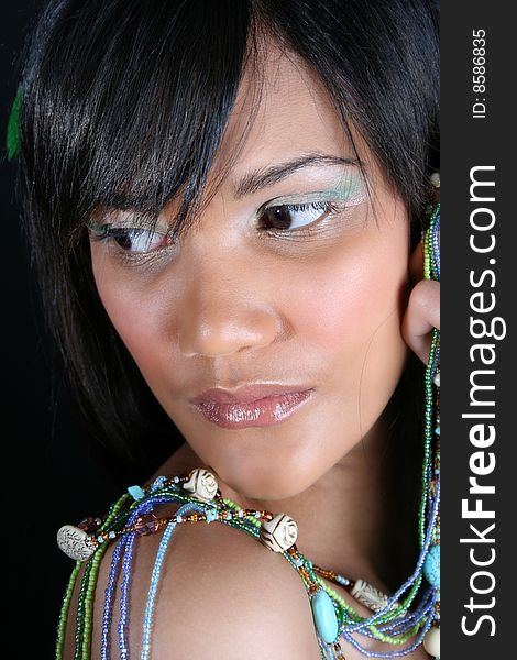 Beautiful young female model with accessories and jewelery