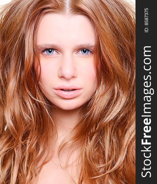 Portrait of the beautiful woman with red hair. Portrait of the beautiful woman with red hair.