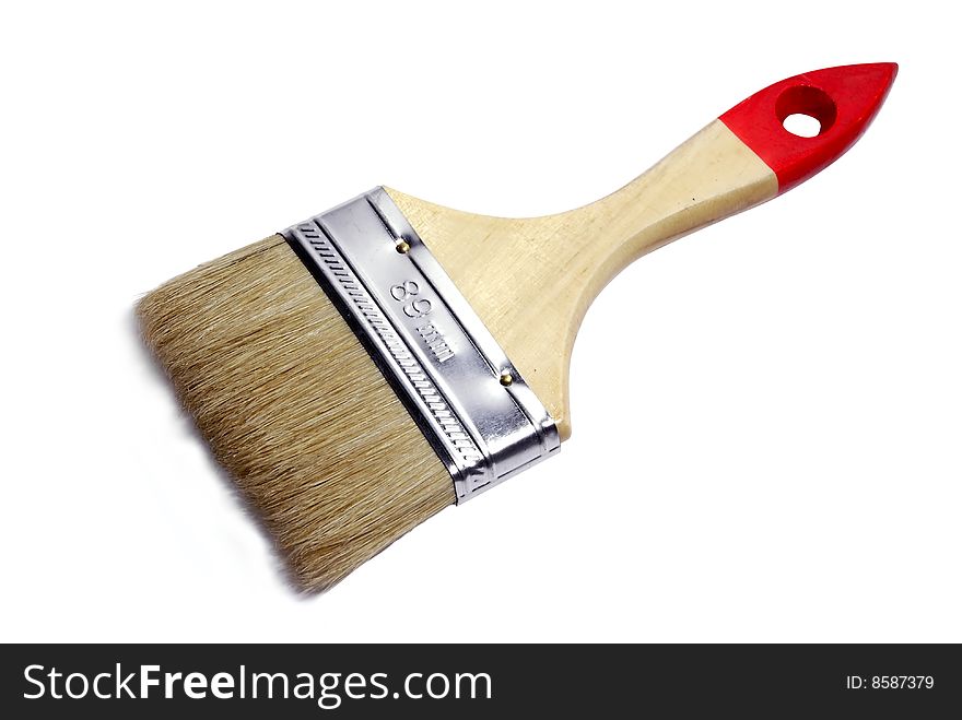 Paintbrush with a wooden handle isolated on a white background