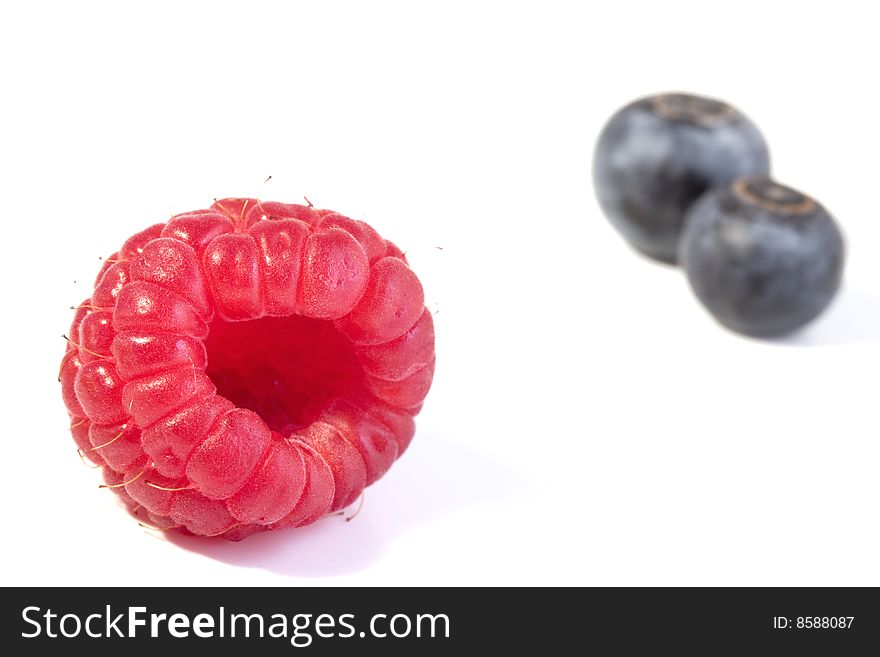 Blueberry and raspberry studio isolated on a white background