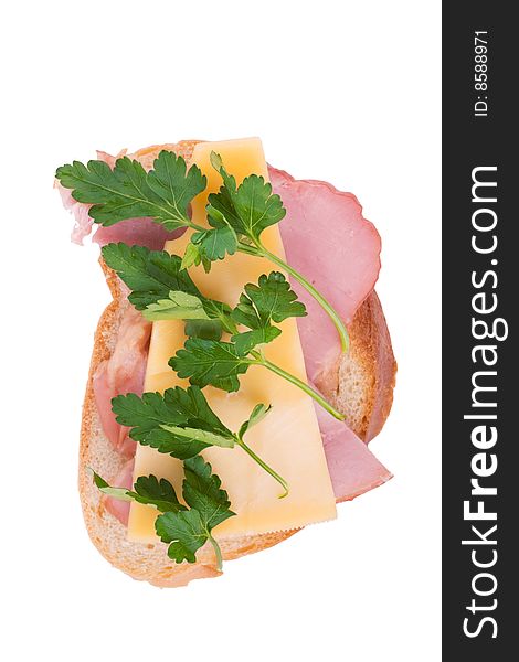 Open faced sandwich with ham, cheese and parsley isolated over white. Open faced sandwich with ham, cheese and parsley isolated over white